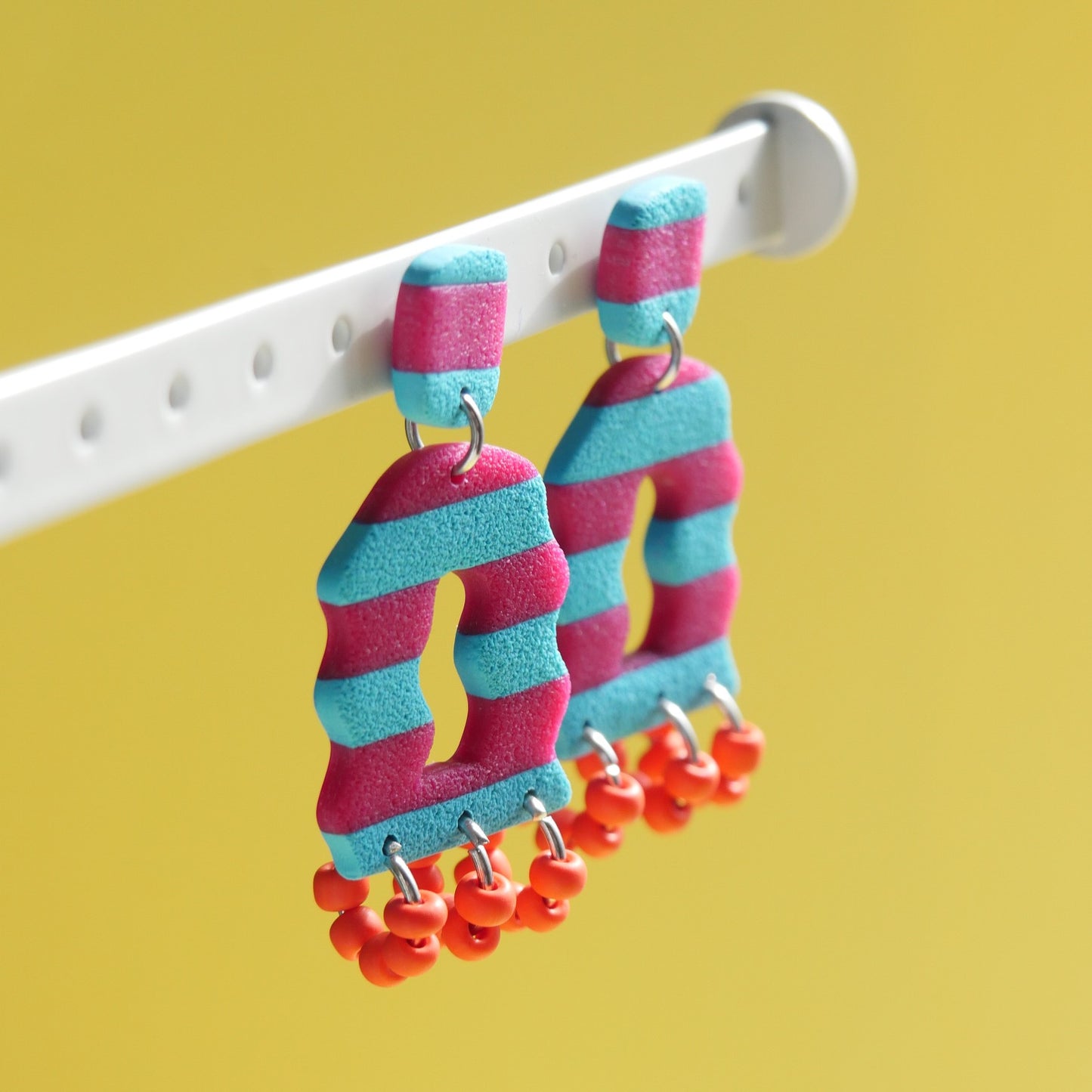 Boucles Rayures perles orange A 15 - Crocodile agile